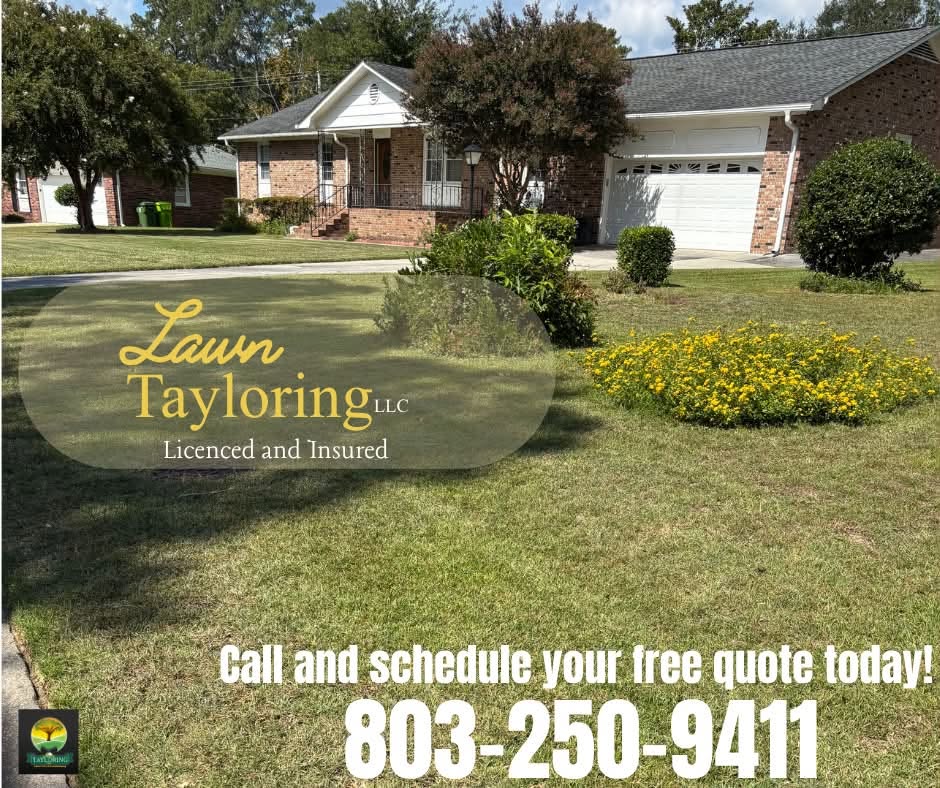Clean front lawn with flower beds on brick home